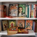B01. Lot including complete vintage set of Oz books, as well as additional copies, later Oz books by other authors, collectors guides and Gregory Maguire Wicked books. 